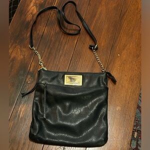 Black faux leather Juicy Couture purse.